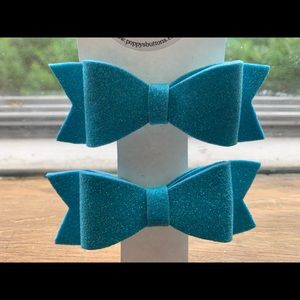 Pair of light blue hair bows